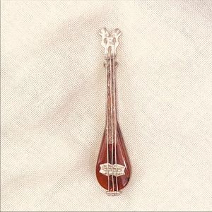 VINTAGE AMBER AND STERLING MANDOLIN PIN